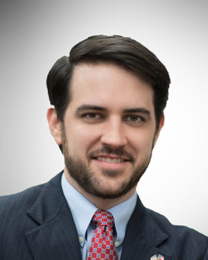 Thomas Sherrer Headshot cropped 2 x 2.5 gray background 600 wide